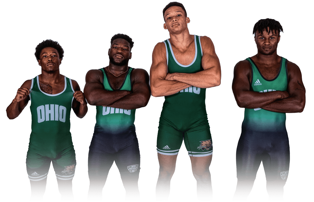 A group of student-athlete wrestlers posing